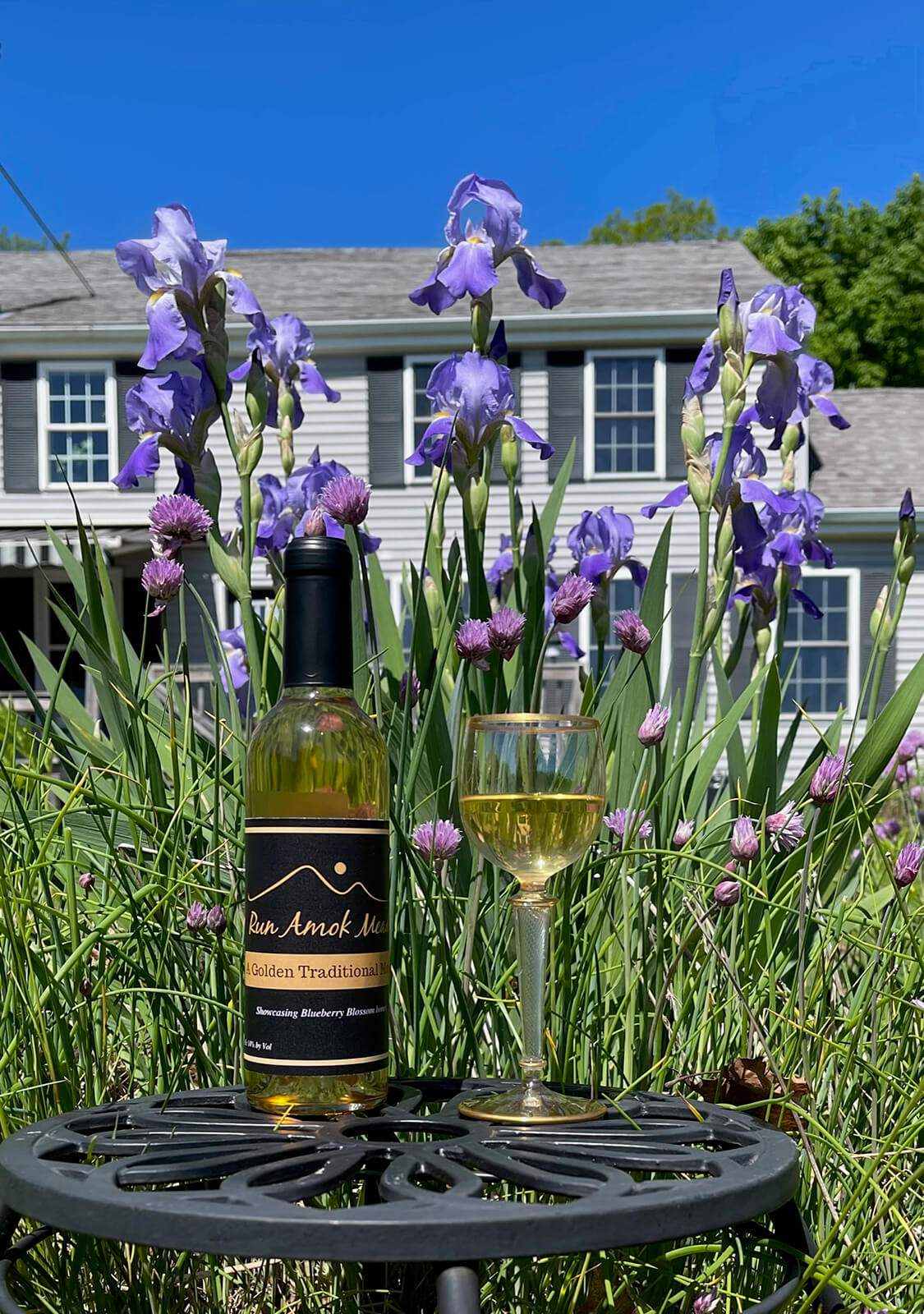 a mead bottle on a table outside